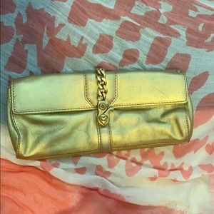 Juicy Couture gold clutch
